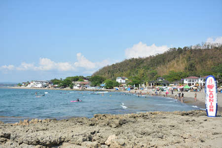LA UNION, PH - APRIL 18 - Beach water and sands with swimmers on April 18, 2019 in La Union, Philippines.のeditorial素材