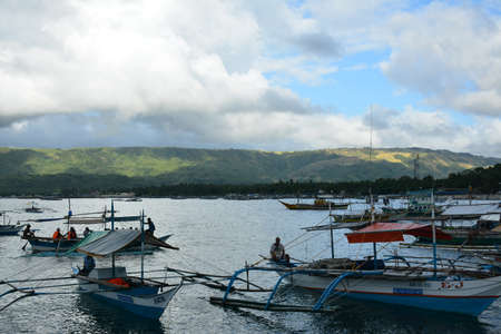 AURORA, PH - APRIL 21 - Motorized wood boats at Dingalan feeder port on April 21, 2019 in Aurora, Philippines.のeditorial素材