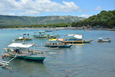 AURORA, PH - APRIL 21 - Motorized wood boats at Dingalan feeder port on April 21, 2019 in Aurora, Philippines.のeditorial素材