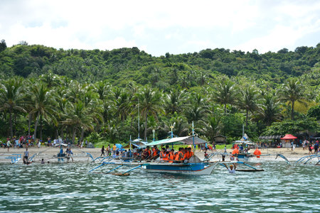AURORA, PH - APRIL 21 - People gather at White beach resort on April 21, 2019 in Dingalan, Aurora,...