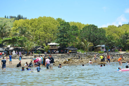 AURORA, PH - APRIL 21 - People gather at White beach resort on April 21, 2019 in Dingalan, Aurora,...