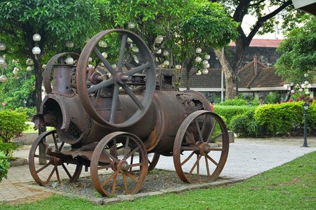 MANILA, PH - OCT. 5 - Baluarte De San Diego rusty locomotive train and parts display at Intramuros...