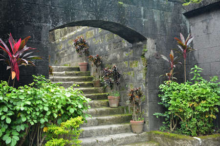 Outdoor stairs made from bricks with plants at sides during Spanish era in the Philippinesの写真素材