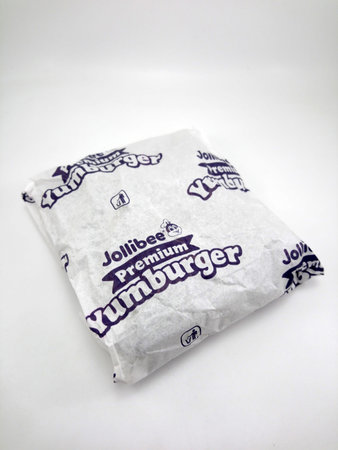 MANILA, PH - OCT 5 - Jollibee premium yum burger on October 5, 2020 in Manila, Philippines.