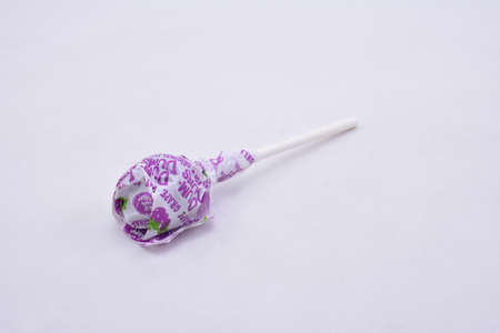 MANILA, PH - JULY 9 - Dum dum lollipop candy grape flavor on July 9, 2021 in Manila, Philippines.のeditorial素材