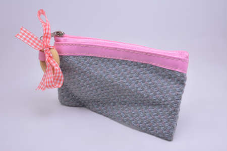 Gray and pink small pouch use to put small itemsの写真素材
