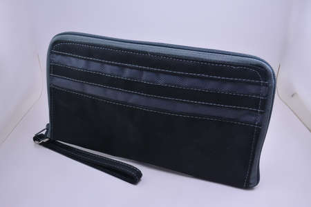 Black check book pouch with handle use to put checks and cash money insideの写真素材