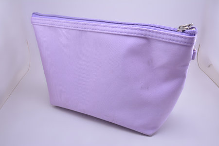 Purple pouch use to put small toiletries itemの写真素材