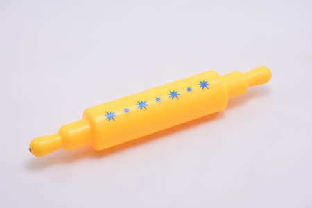 Plastic cylindrical shape clay rolling pin toy played by kidsの写真素材
