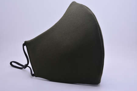 Green washable face mask wear use to cover mouth against virus for adultsの写真素材