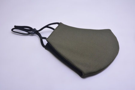 Green washable face mask wear use to cover mouth against virus for adultsの写真素材