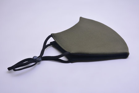 Green washable face mask wear use to cover mouth against virus for adultsの写真素材