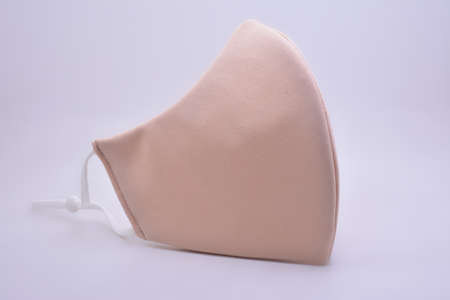 Flesh color washable face mask wear use to cover mouth against virus for adultsの写真素材