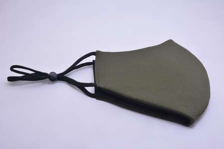 Green washable face mask wear use to cover mouth against virus for adultsの写真素材
