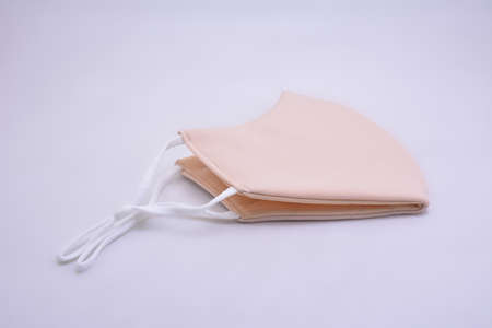 Flesh color washable face mask wear use to cover mouth against virus for adultsの写真素材