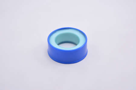 Blue circle case tape or thread sealant generally used as a sealant and lubricating material, perfect for installing fittings in the kitchen and bathroomの写真素材
