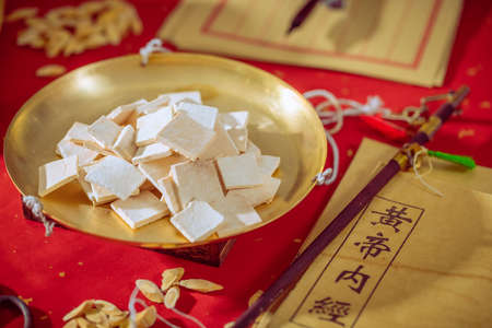 Chinese medicine Poria cocos on the weighing panの写真素材