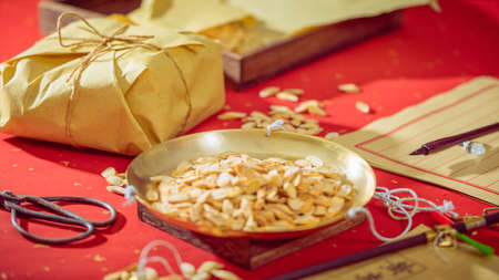 Astragalus, an ancient traditional Chinese medicine herbal medicine, is placed on the weighing panの写真素材