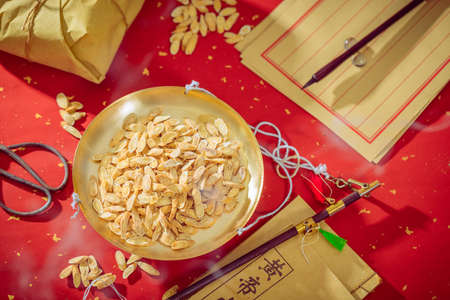 Astragalus, an ancient traditional Chinese medicine herbal medicine, is placed on the weighing panの写真素材