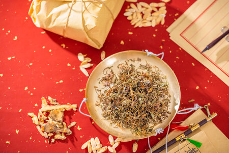 Sun-dried dandelion with ancient Chinese herbal medicineの写真素材