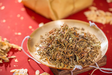 Sun-dried dandelion with ancient Chinese herbal medicineの写真素材