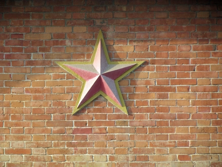 a  pentacle on red brick wallの写真素材