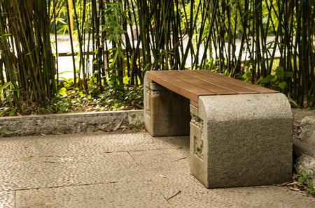 a bench in a parkの写真素材