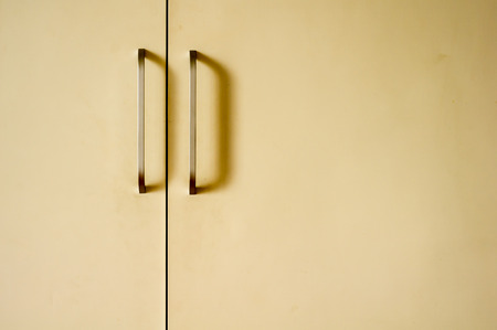 handles on a door of wardrobeの写真素材