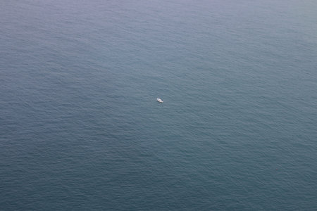 Lonely Boat in the Seaの写真素材