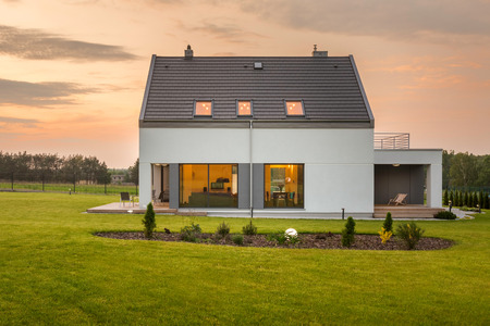 Modern white villa in green environment, outdoor viewの写真素材