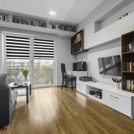 Modern living room with relax and work areasの写真素材