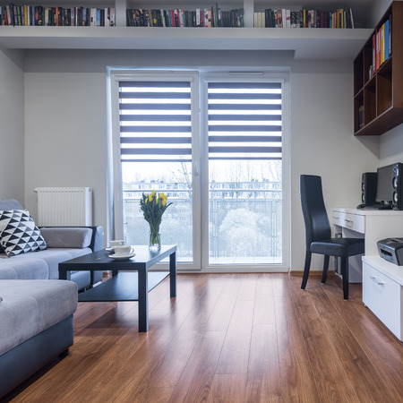 New design home interior with balcony, sofa and small tableの写真素材