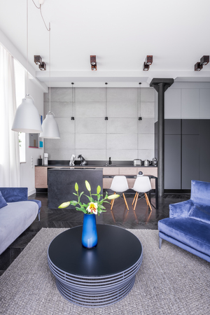 Decorative openwork coffee table standing in modern apartmentの写真素材