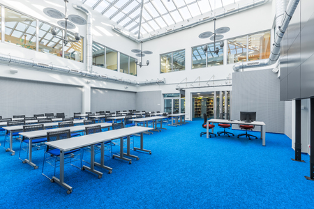 Modern and bright library meeting room in grey and blueの写真素材