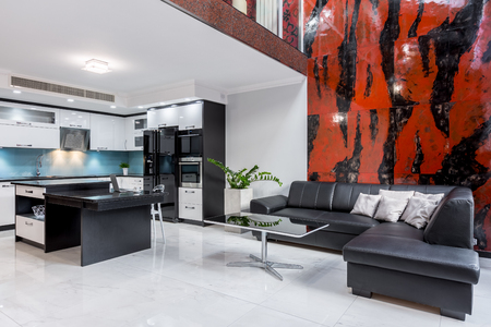 Interesting and modern interior of the apartment with mezzanine and minimalist design の写真素材