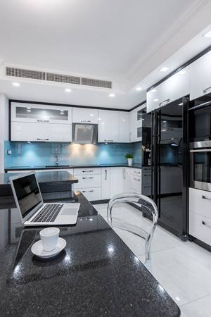 Comfortable place to work combined with modern kitchen interiorの写真素材
