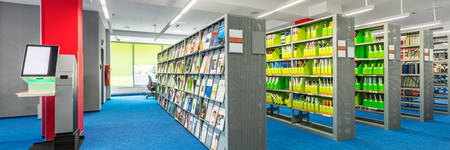 Banner view of modern design in library interior with functional shelf systemの写真素材