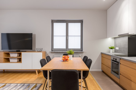 Modern open space apartment with kitchen, dining room and living room connectedの写真素材