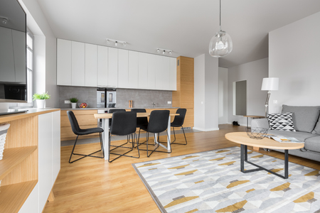 Modern dining room with contemporary kitchen furniture and relax areaの写真素材