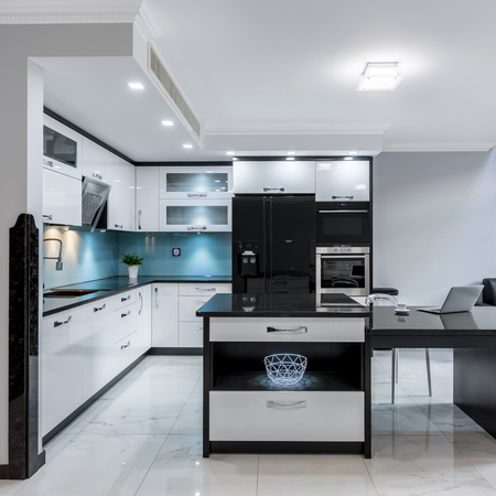 Modern and luxury black and white kitchen space with islandの写真素材