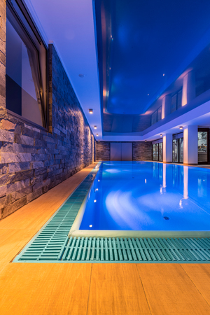 Modern and elegant villa swimming pool with brick wallの写真素材