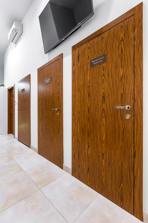 Hall with doors to offices in private clinicの写真素材