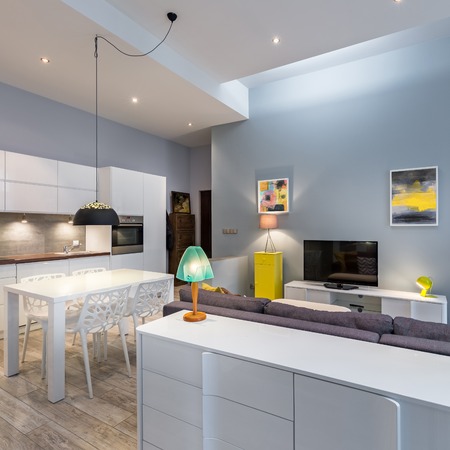 Modern home interior with white dresser and tableの写真素材