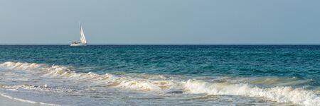 Panorama of yacht on blue water of atlantic ocean near Sal island, Cabo Verde, Cape Verdeの写真素材