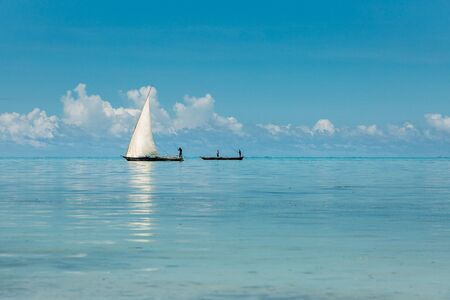 Two sailing boats on amazing blue and calm Indian Oceanの写真素材