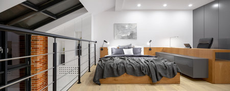 Panorama of mezzanine with bedroom and home office in loft style apartment