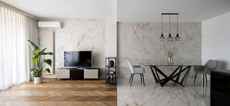 Panorama of stylish tv room with big windows, television screen on sideboard, wooden floor next to fancy dining room with modern table with two nice chairs and marble tiles on floor and wallの写真素材