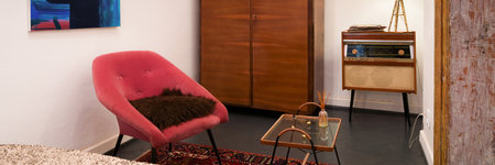 Panorama of small room with vintage furniture and decorationsの写真素材