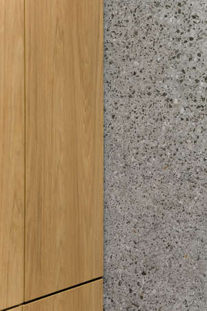 Natural wooden panel and gray terrazzo tile, architectural backgroundの写真素材