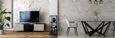 Panorama of elegant dining area with modern table and comfortable chair and marble wall and floor tiles next to tv room with big television screen, marble wall and wooden floorの写真素材